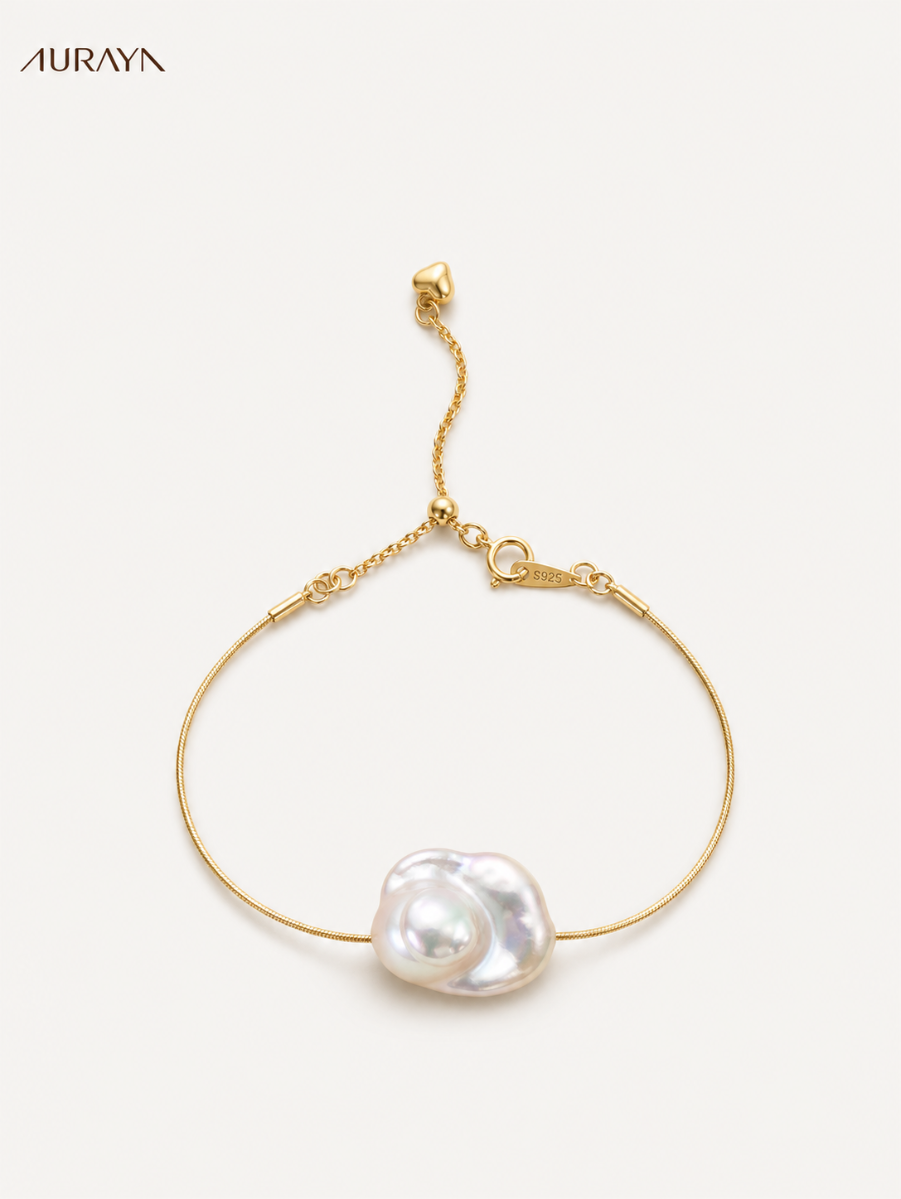 Serpentine Baroque Pearl Bracelet, full bracelet layout on a white studio background