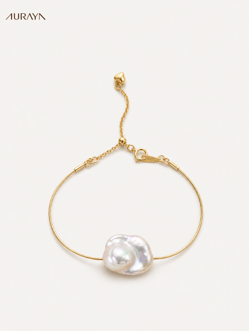 Serpentine Baroque Pearl Bracelet, full bracelet layout on a white studio background
